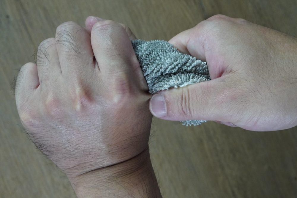 Wash each pad and wring it gently to remove the excess water.